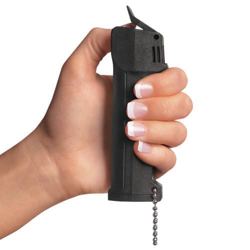 Mace Triple Action Police Pepper Spray Shown In Hand