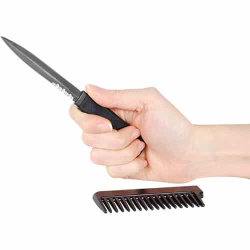 Covert Black Comb Hidden Metal Knife viewed in Hand