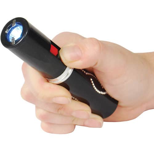 Black Stun Master Lipstick Rechargeable Flashlight Stun Gun Viewed in Hand