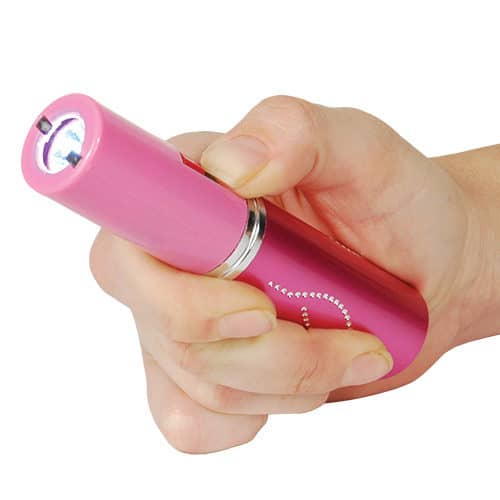 Stun Master Pink Lipstick Stun Gun Rechargeable Flashlight Viewed in Hand