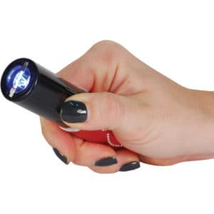 Red Stun Master Lipstick Rechargeable Flashlight Stun Gun Viewed in Hand