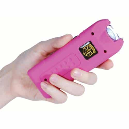MultiGuard Pink Rechargeable Stun Gun Personal Alarm with LED Flashlight Shown in Woman's Hand