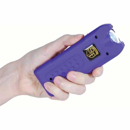 Purple MultiGuard Rechargeable Stun Gun With Personal Alarm and LED Flashlight Demonstrated in Hand