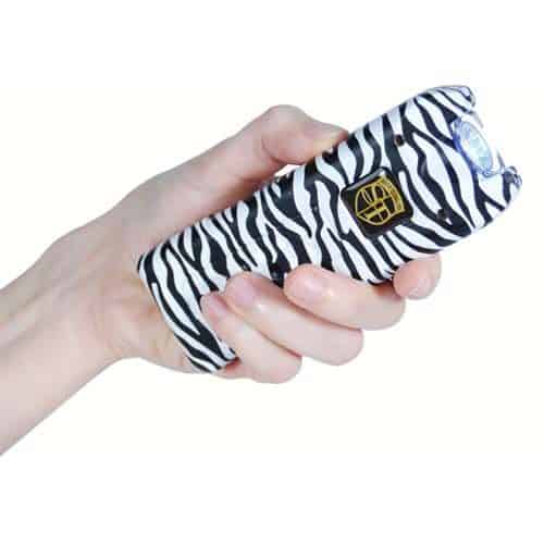 MultiGuard Rechargeable Zebra Print Stun Gun With Personal Alarm and LED Flashlight Demonstrated in Hand