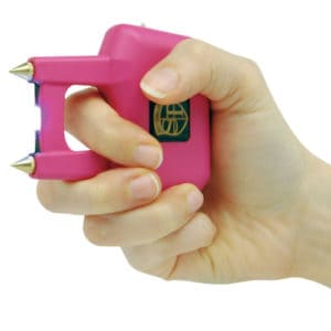 Pink Stun Gun with Spikes Viewing in woman Hand