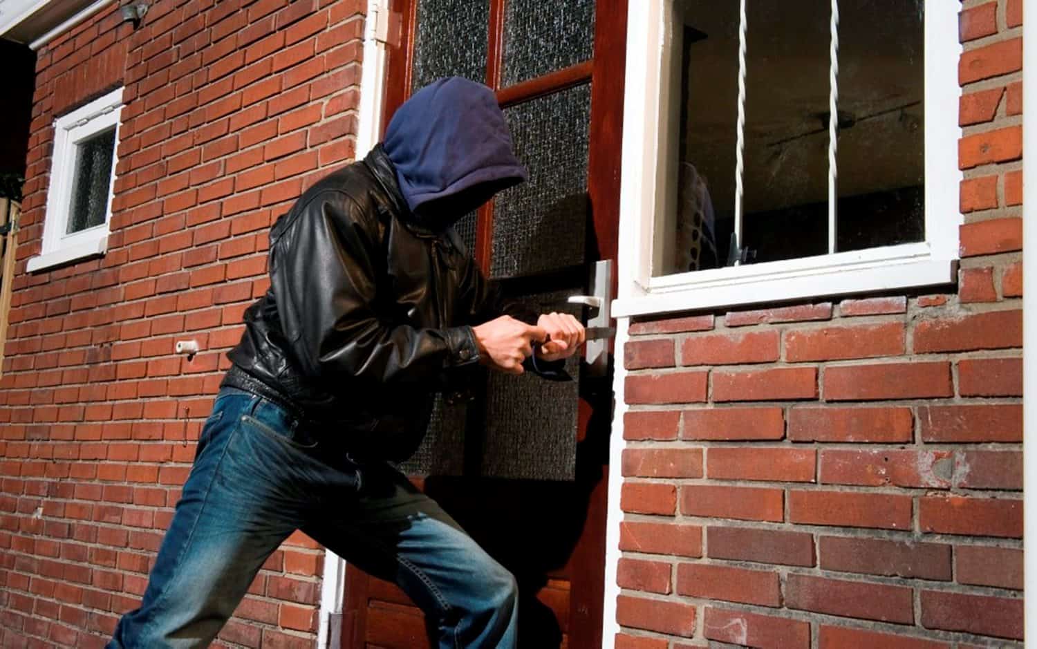 Burglar Breaking into a House - Get a DIY Home Security System
