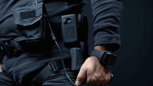 Man with gear on preparing to train with stunning devices.